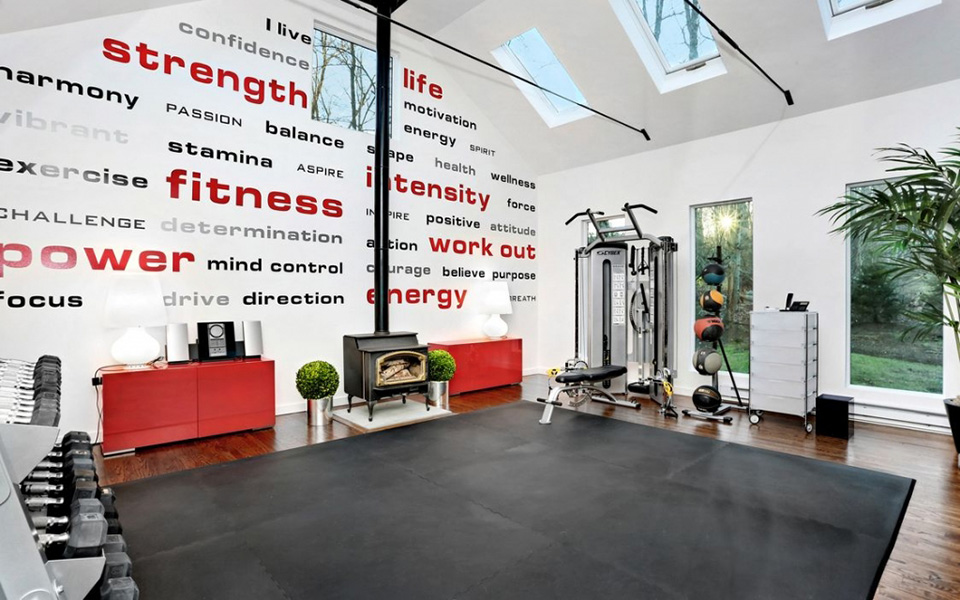 home gym with wall art